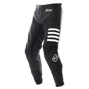 Black motocross pants with white stripe graphics and F4H logo patch