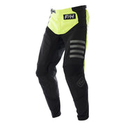 Black motocross pants with hi-viz yellow panels, gray stripes, and F4H logo patch