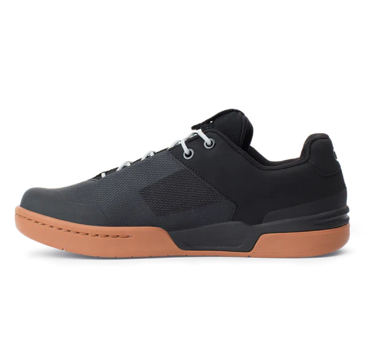 Mountain bike shoes with black mesh upper, lace closure, and gum rubber sole