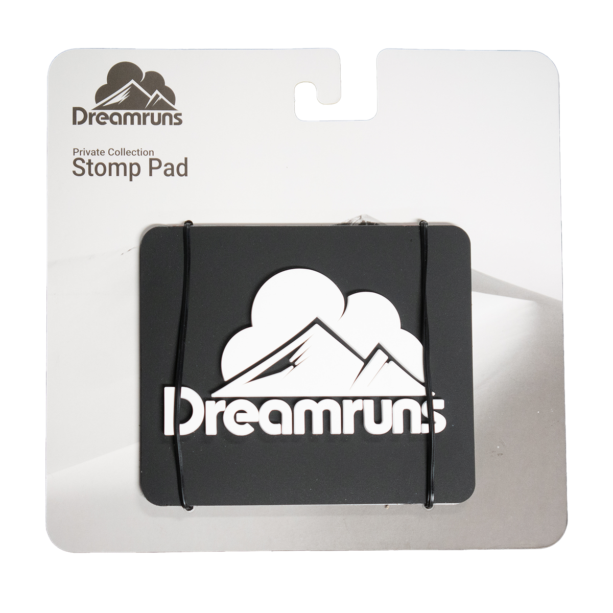 Black Dreamruns stomp pad with adjustable mounting strap