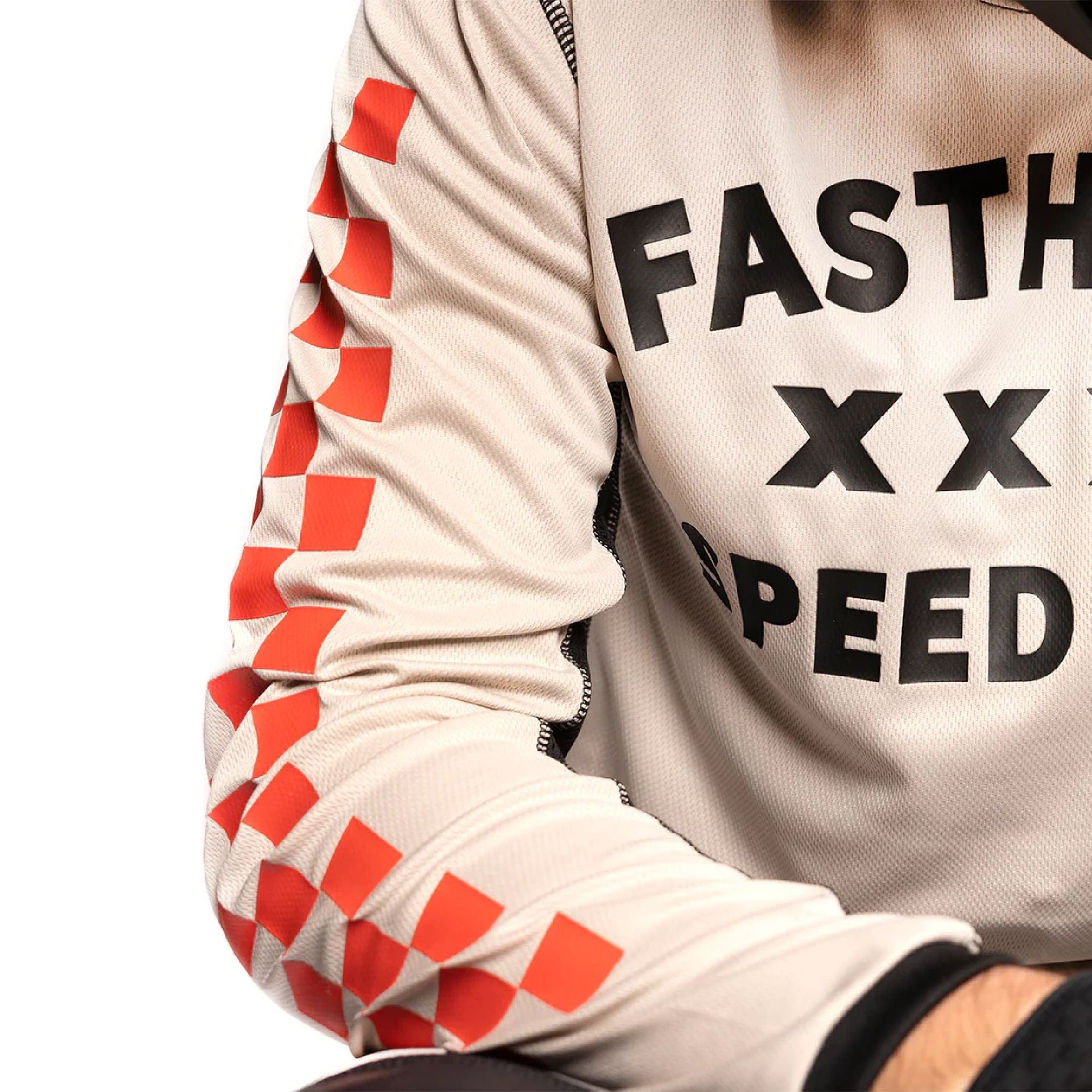 Cream long-sleeve jersey sleeve with red checker stripe and black cuff