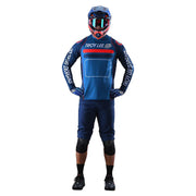 Blue motocross riding shorts with elastic waist and knee protection coverage