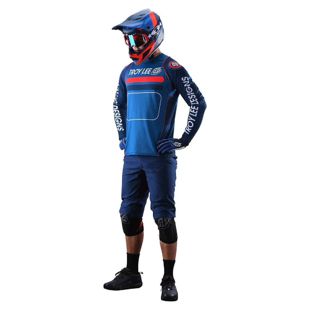 Blue motocross riding shorts with side vents and knee pad coverage