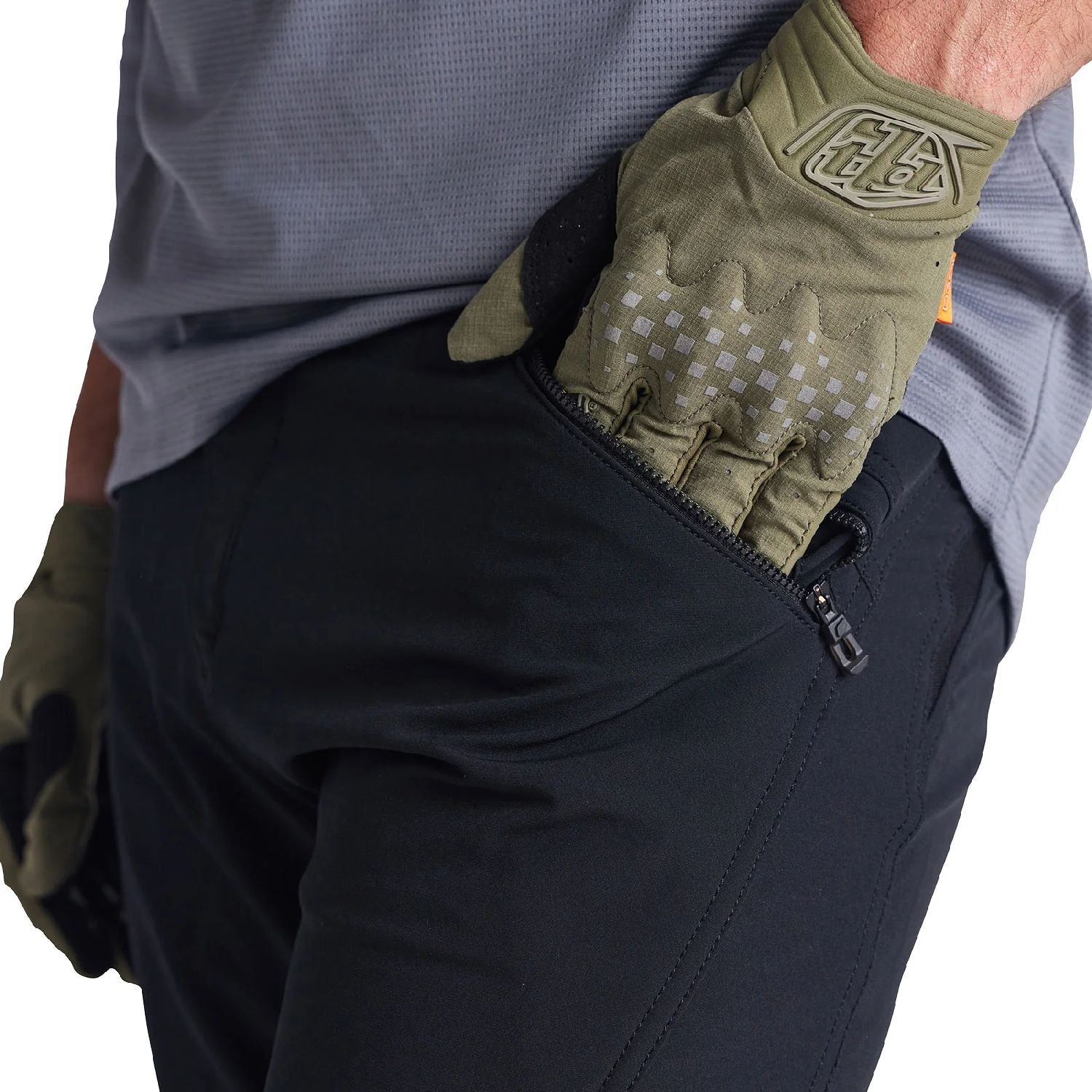 Black riding shorts with liner, zip pocket and reinforced seam detail