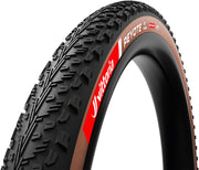 Tubeless bike tire with black tread and brown sidewall, Vittoria Peyote label