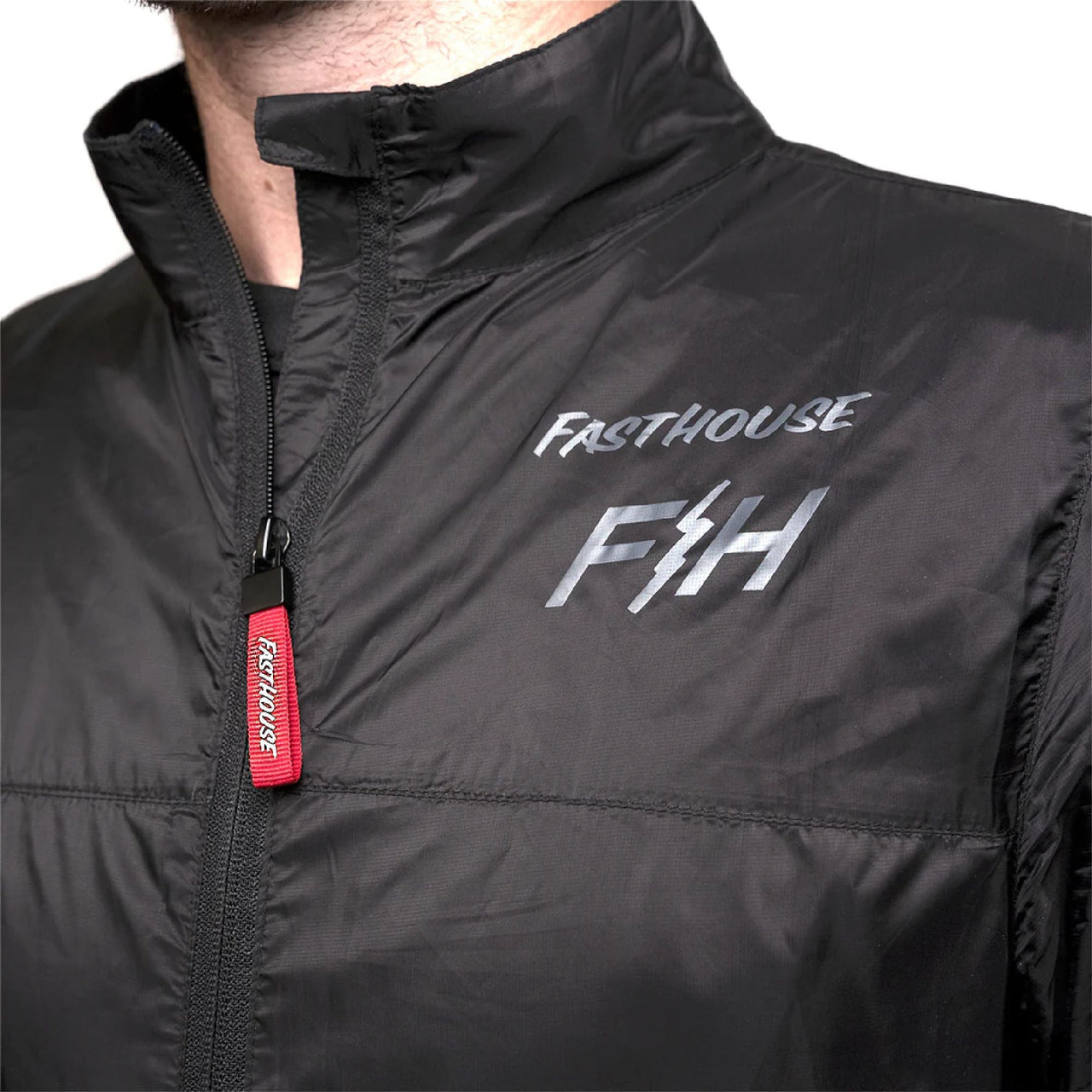 Fasthouse packable windbreaker jacket with dark finish and front zipper
