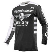 Motorcycle jersey with black body and white sleeves, winged skull logo and striped side panels.