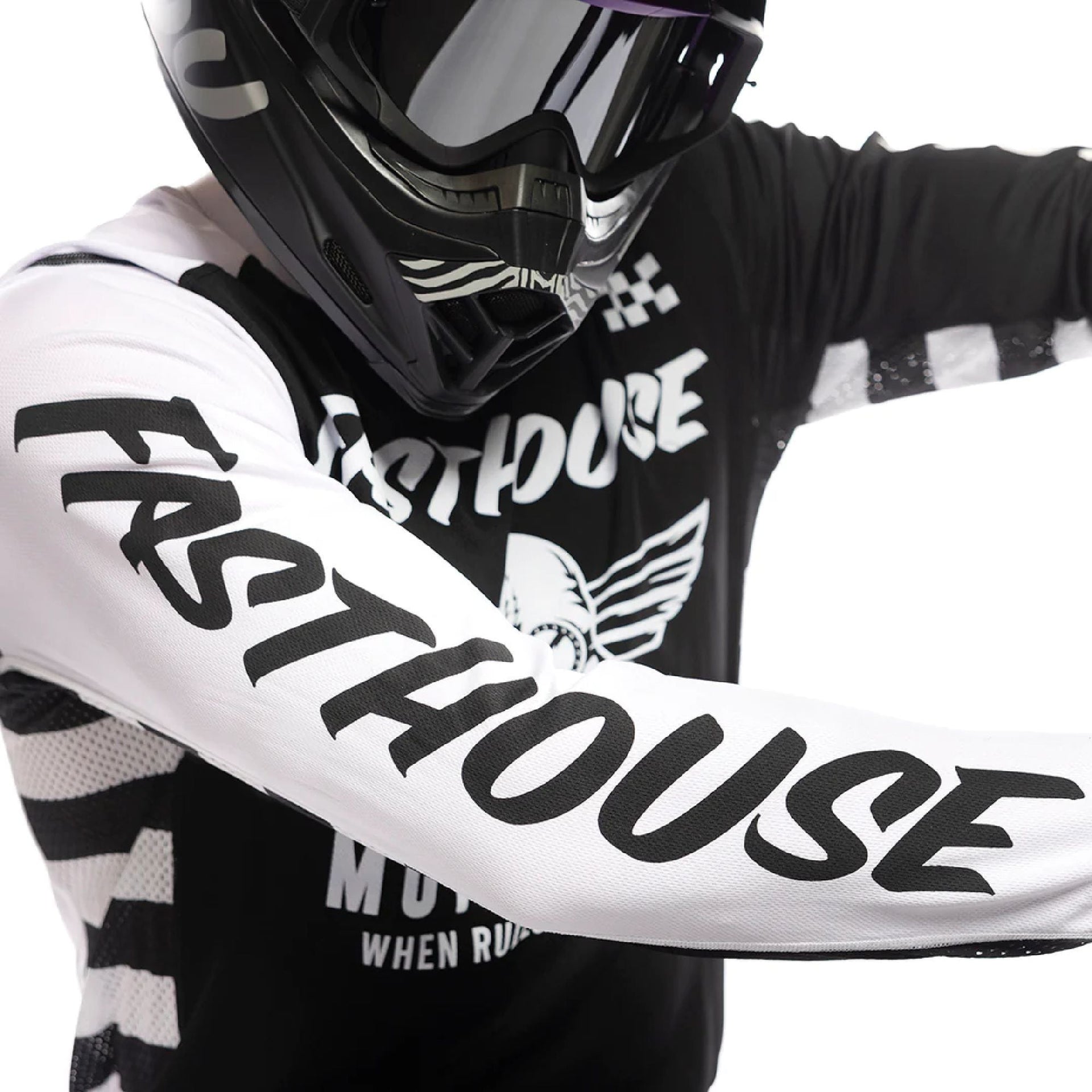 Youth motocross jersey close-up, black and white with large sleeve lettering