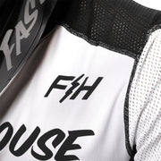 White and black youth air-cooled jersey with F&H logo on black-edged panel