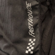 Close-up of charcoal/black jersey fabric with Fasthouse vertical logo and check print