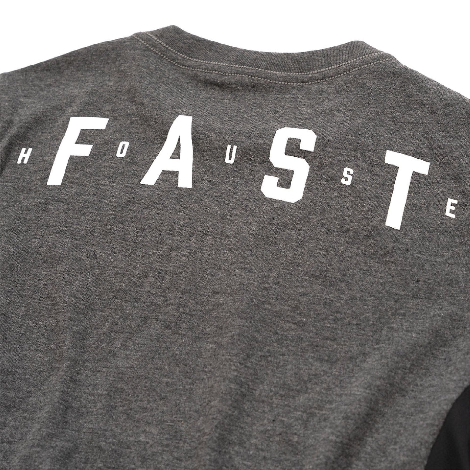 Charcoal heather women’s tech tee back close-up with large Fasthouse lettering
