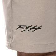 Ash gray shorts with black Fasthouse Speed Shop logo on the leg