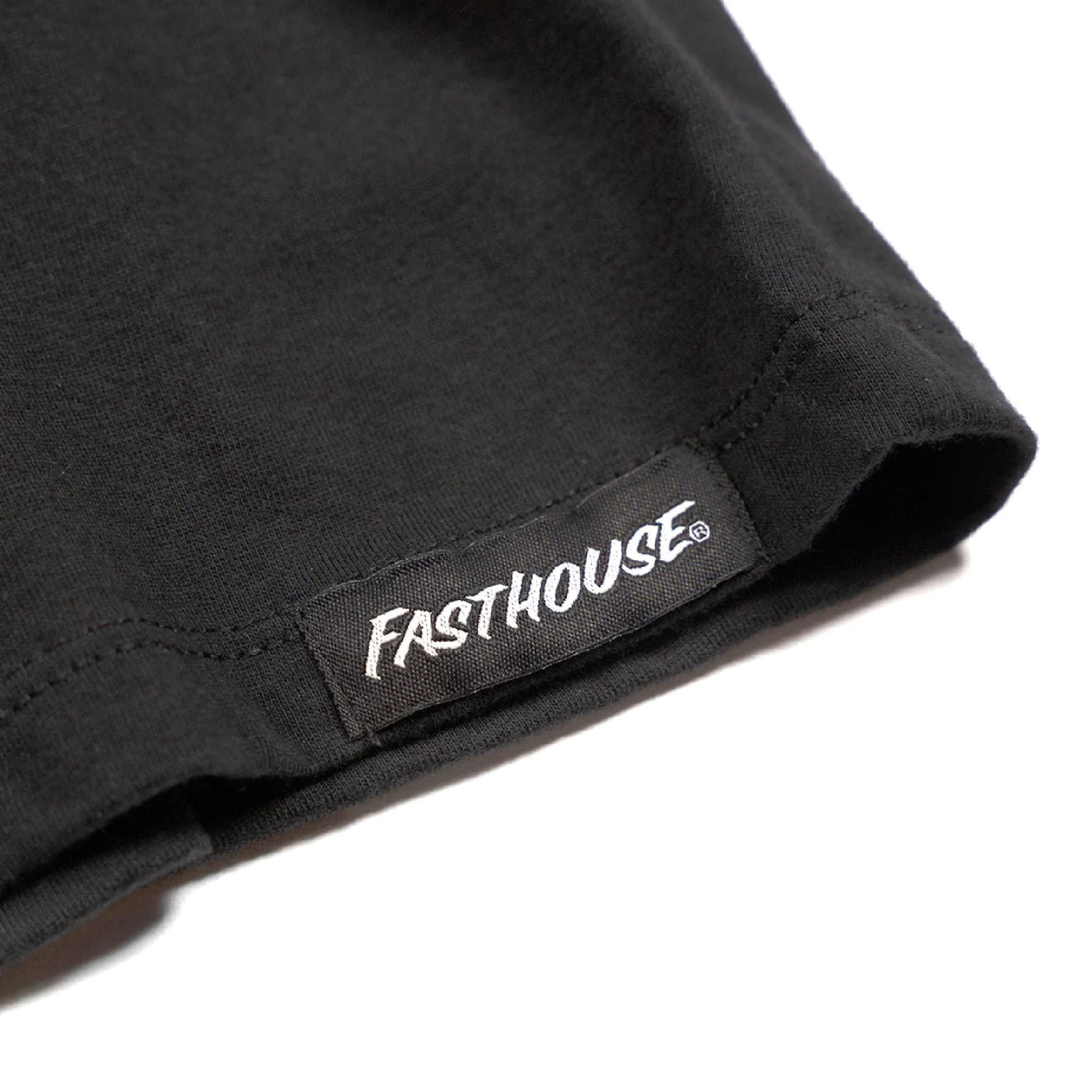 Women's black short-sleeve tee hem tag patch