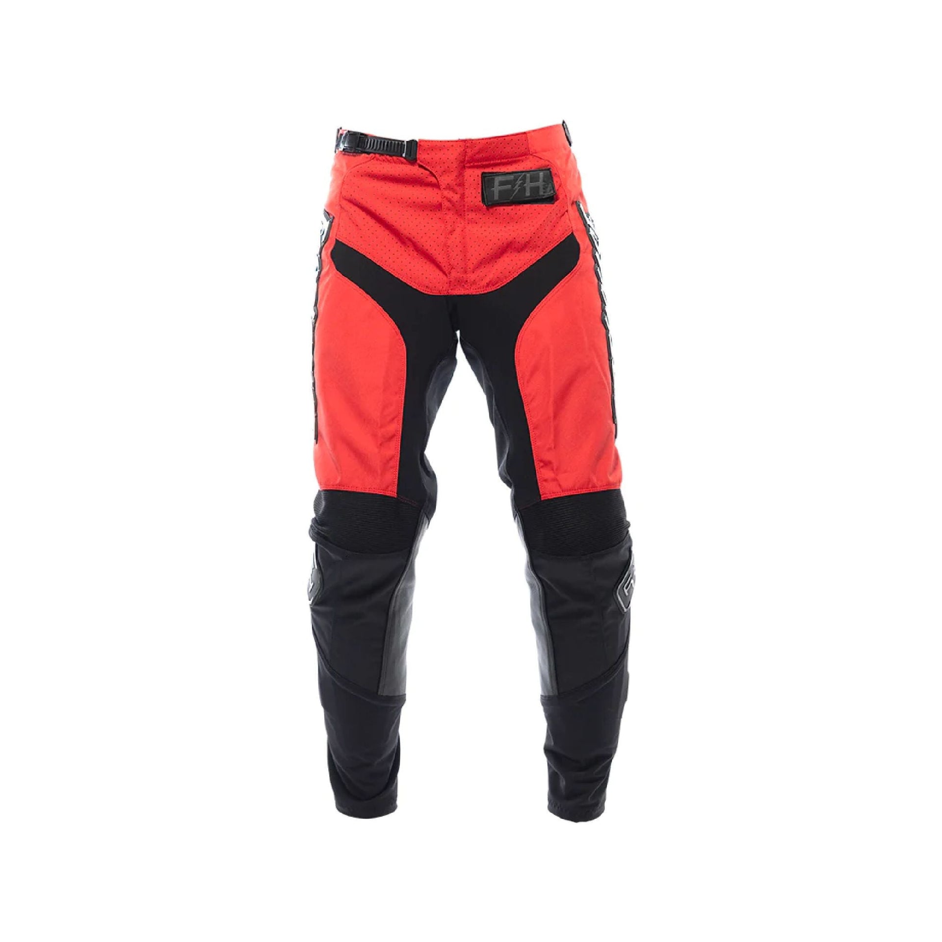 Youth motocross pants in bright red with black lower legs and knee armor, Fasthouse.