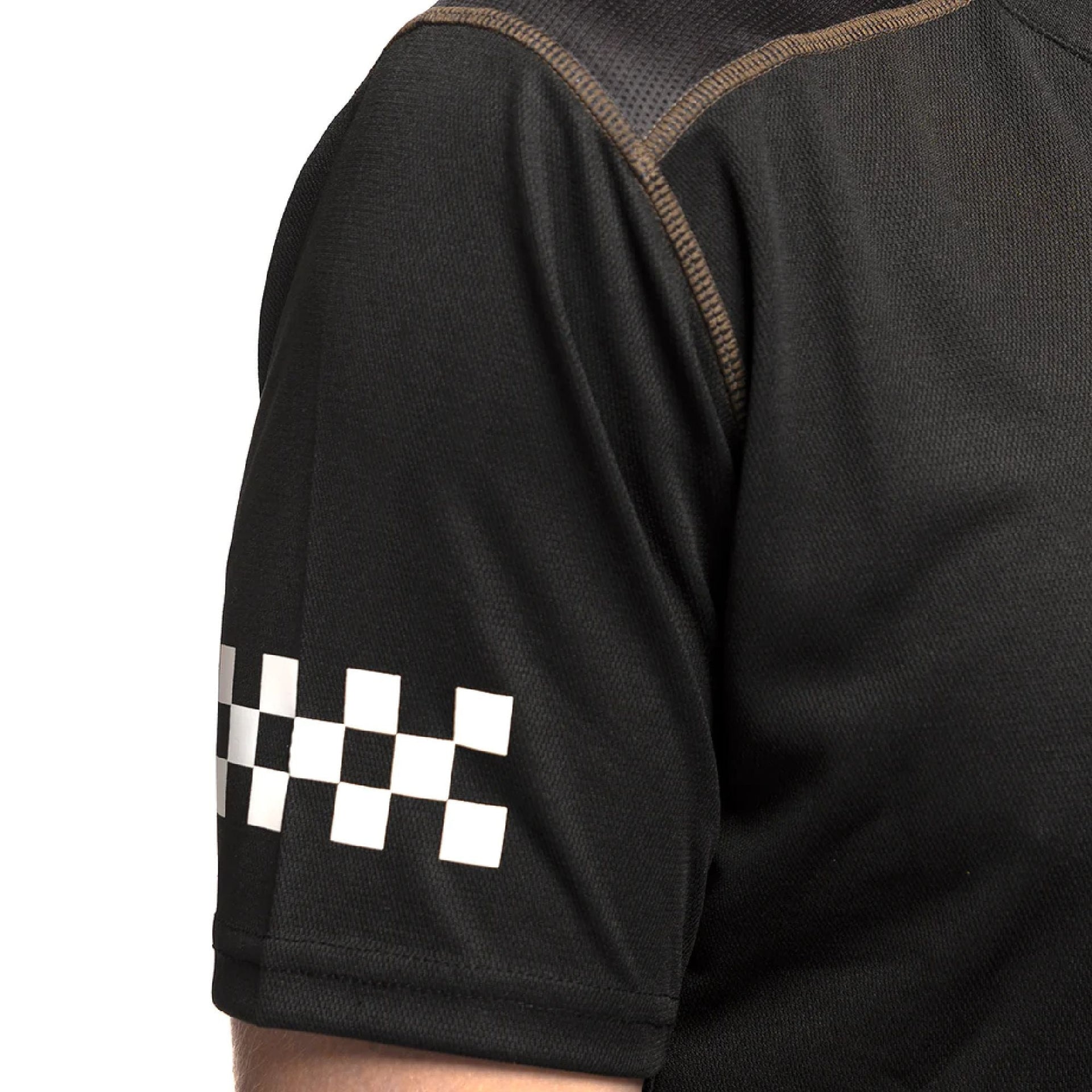 Youth short-sleeve jersey sleeve detail, black with checkered graphic patch
