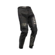 Youth motocross pants in black with reflective side stripes and knee camo patch