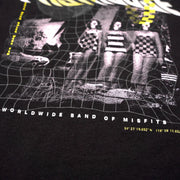 Black youth short-sleeve tee close-up of glitch artwork and band-of-misfits text
