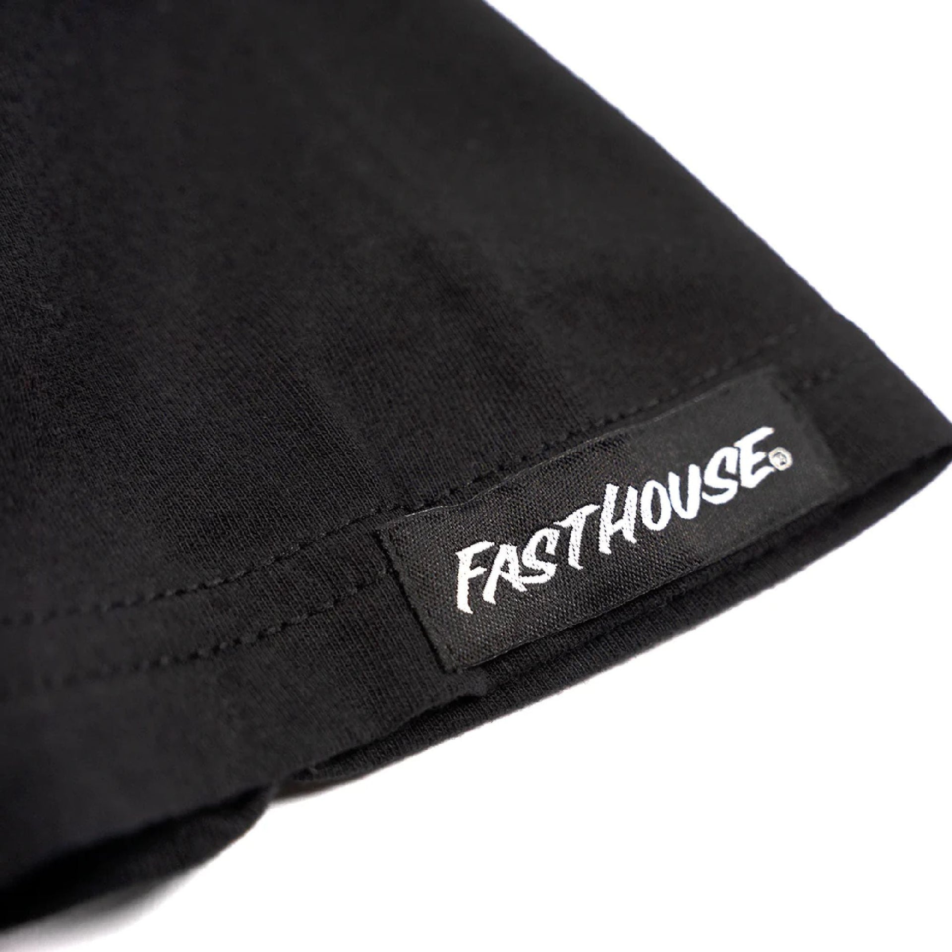 Black youth short-sleeve tee cuff with Fasthouse logo label