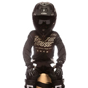 Black youth jersey with large gold and white graphic text, long sleeves