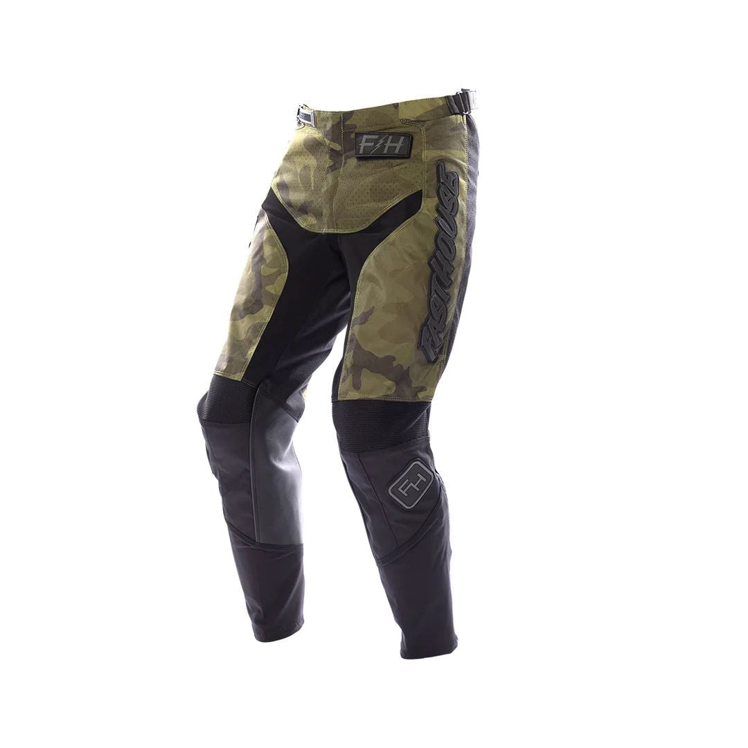 Youth motocross pants in camo and black with padded knee panels, Fasthouse logos.