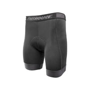 Black youth cycling liner shorts with padded seat and Fasthouse waistband logo