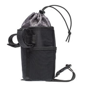 Black nylon carryall bag with drawstring top, front pocket, and adjustable shoulder strap