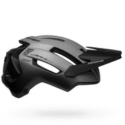 MIPS bike helmet with matte charcoal shell, side vents and Bell logo