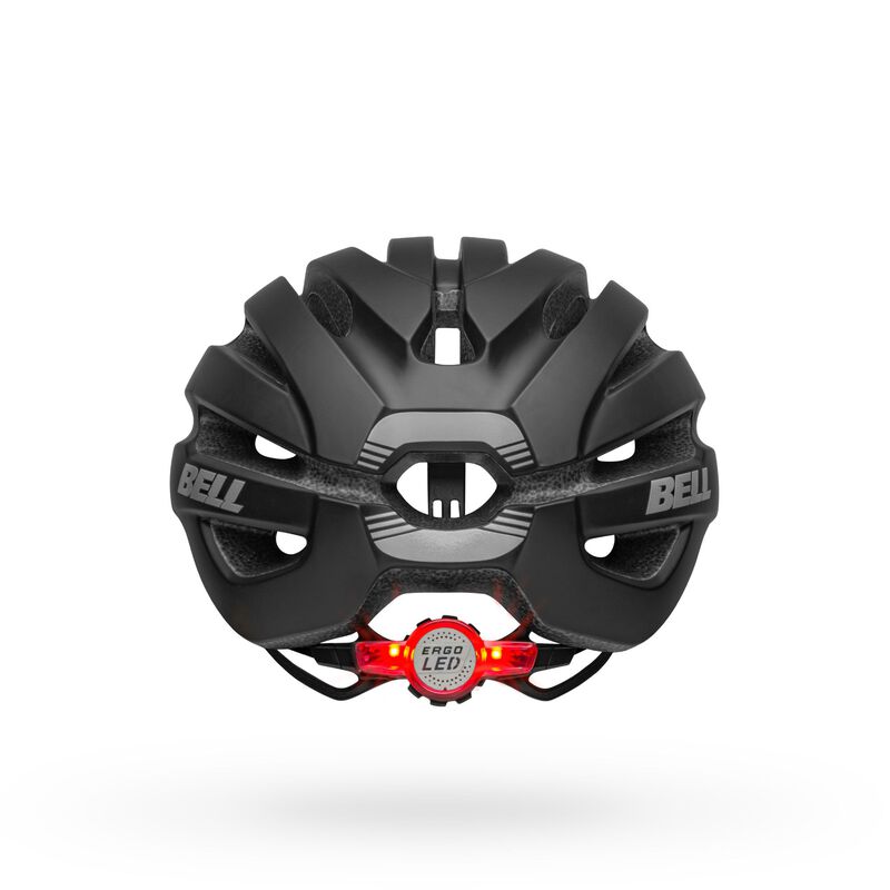 Black helmet interior view with red LED light module and adjustable strap channels