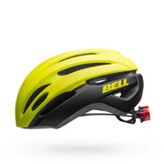 Vented bike helmet in hi-vis yellow with black shell and BELL logo; rear LED visible