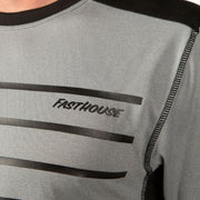 Men's heather grey jersey chest with white stripe graphics and FastHouse logo text.