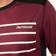 Men's maroon short-sleeve jersey with white horizontal stripe graphics and FastHouse logo.