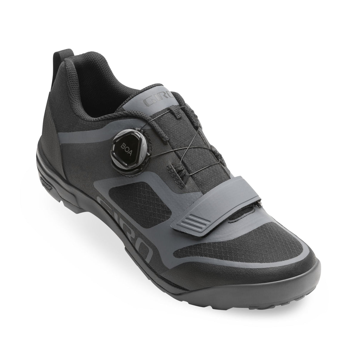 Dark gray cycling shoe with BOA dial and hook-and-loop strap, ventilation panels