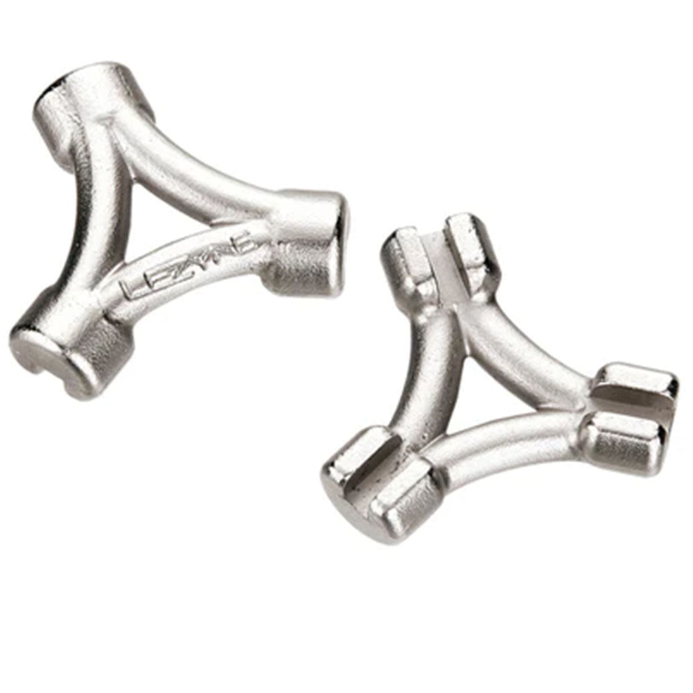 Silver-toned metal bicycle accessory clips with mounting holes and ridged ends
