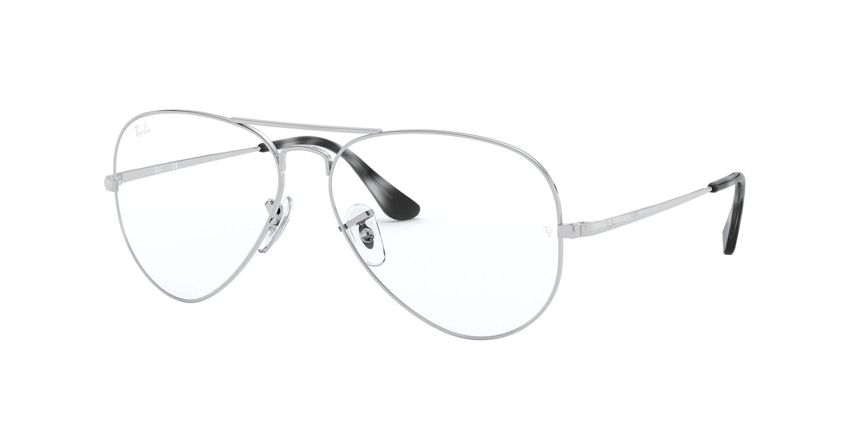Silver prescription eyewear frames with clear lenses and brown-tinted temple detail