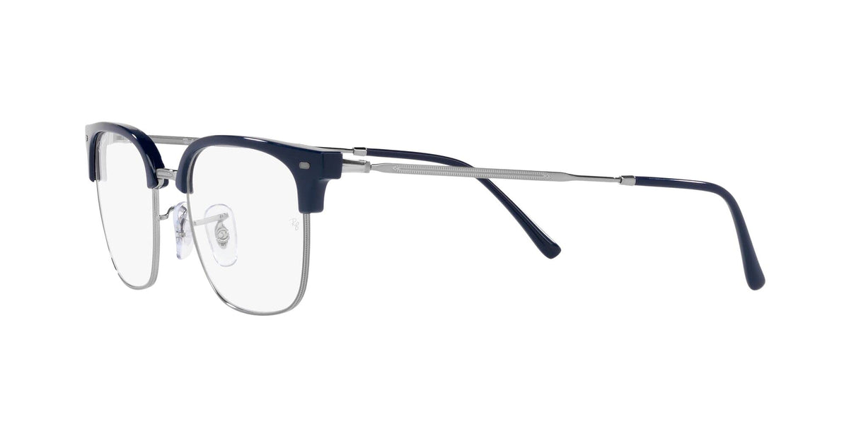 Prescription eyeglass frames in dark blue with clear lenses and silver-toned temples