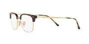 Ray-Ban RX7216 Havana eyeglass frames with clear lenses and rose-gold tone temples, angled