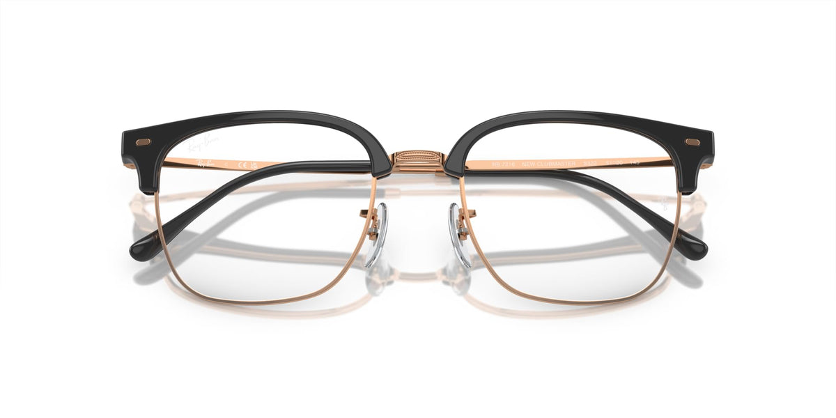 Prescription eyeglass frames front view in black with rose-gold metal accents and clear lenses