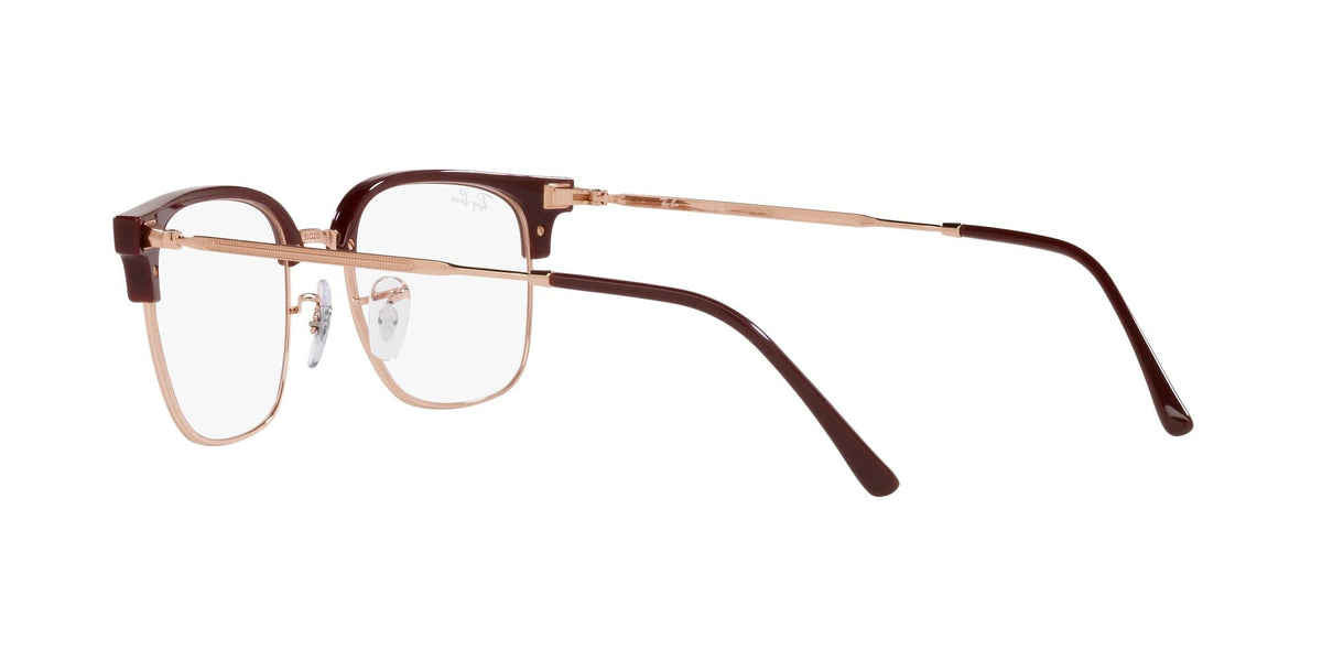 Brown prescription eyewear frames angled side view with rectangular demo lenses and metal temples