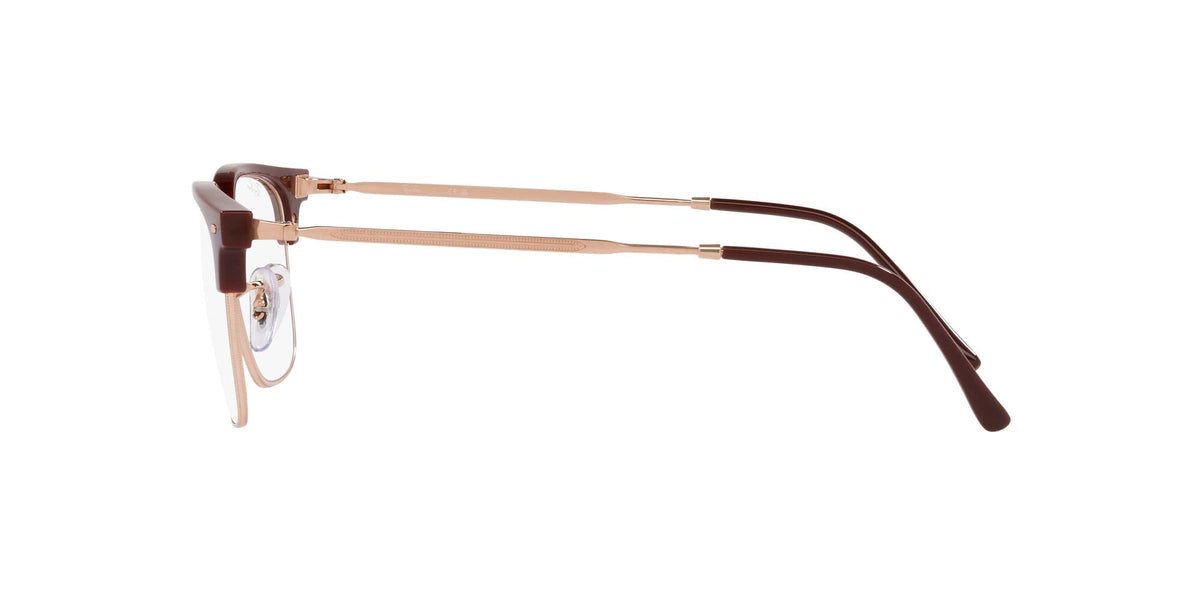 Brown prescription eyewear frames close side view with curved temple arm and demo lens