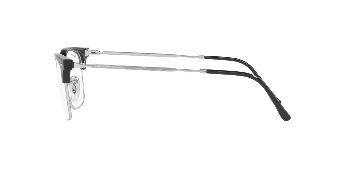 Ray-Ban RX7216 black eyeglass frames with silver metal temples and clear lenses, profile view