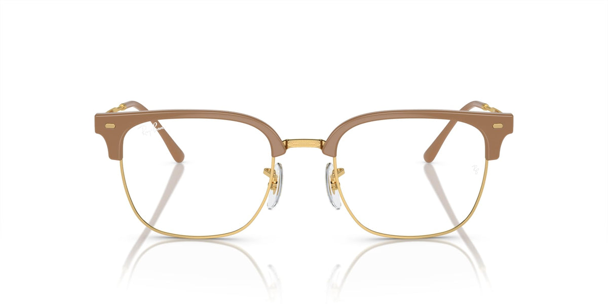 Prescription eyewear frames, brown acetate with gold metal hinges and clear demo lenses