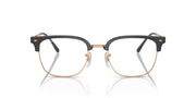 Prescription eyeglass frames in black with rose-gold accents and clear lenses