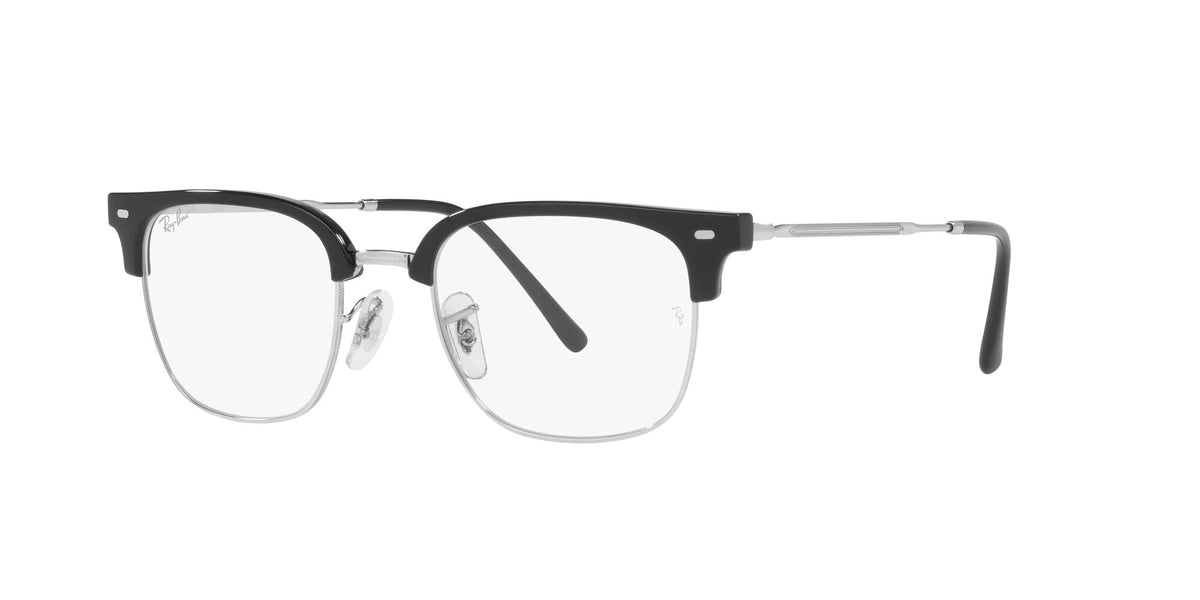 Ray-Ban RX7216 black eyeglass frames with clear lenses and silver metal temples, side angle
