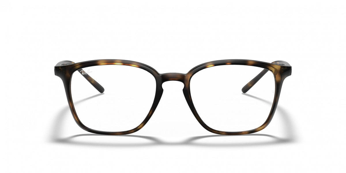 Tortoise eyeglass frames with rounded-square lenses and dark temple details