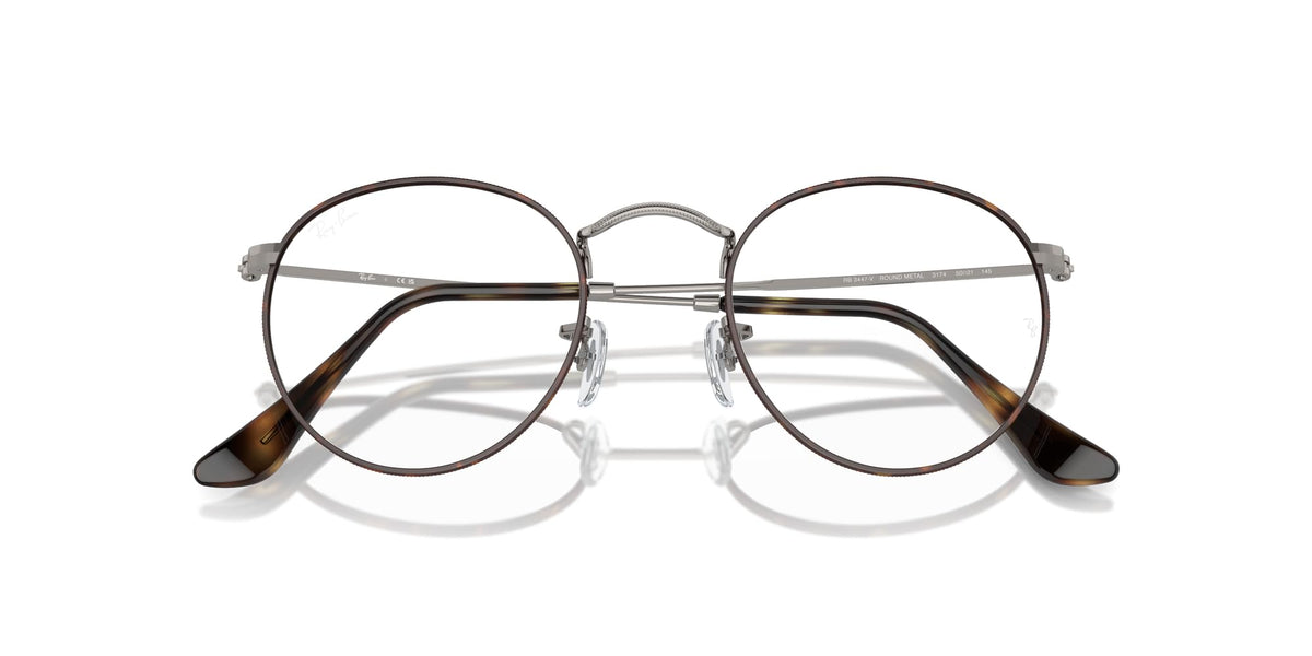 Metal round eyeglass frames with dark rims and clear lenses, hinged bridge