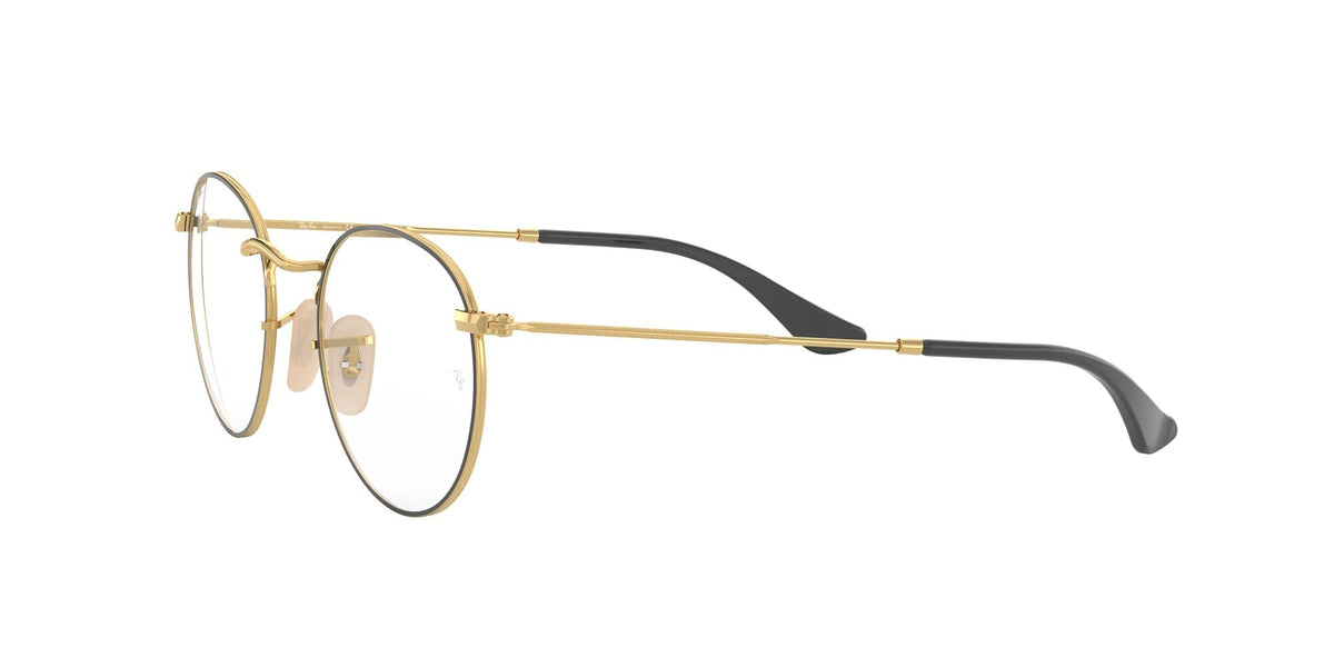 Gold-tone round metal prescription eyewear frames, side view with dark temples