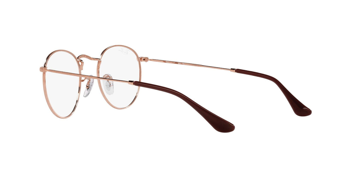 Rose gold round prescription eyewear frames with dark acetate arms