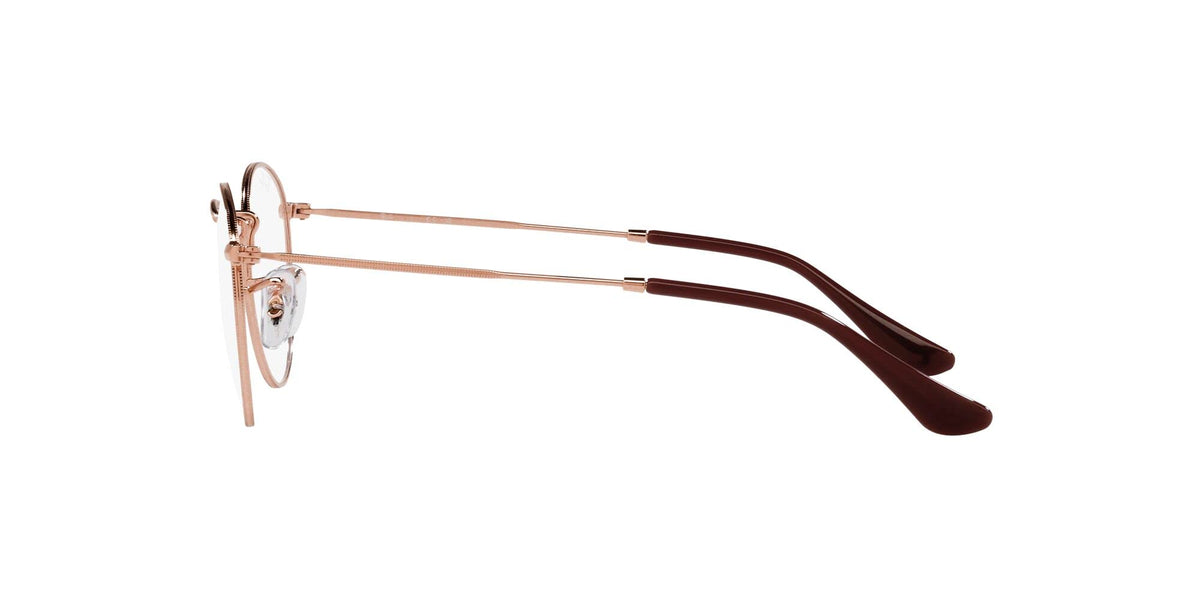 Rose gold metal prescription eyewear frames with dark acetate temple tips