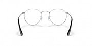 Round prescription eyewear frames with clear lenses, silver-tone rims and black outer temple tips