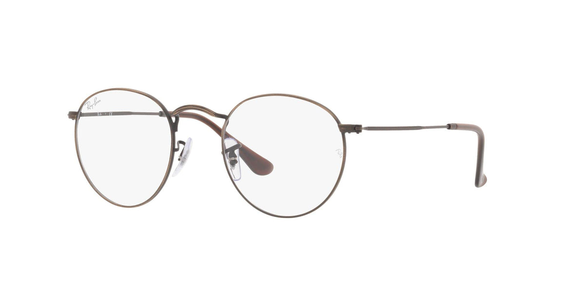 Round prescription eyewear frames with clear lenses, thin metal rims and angled temple arms